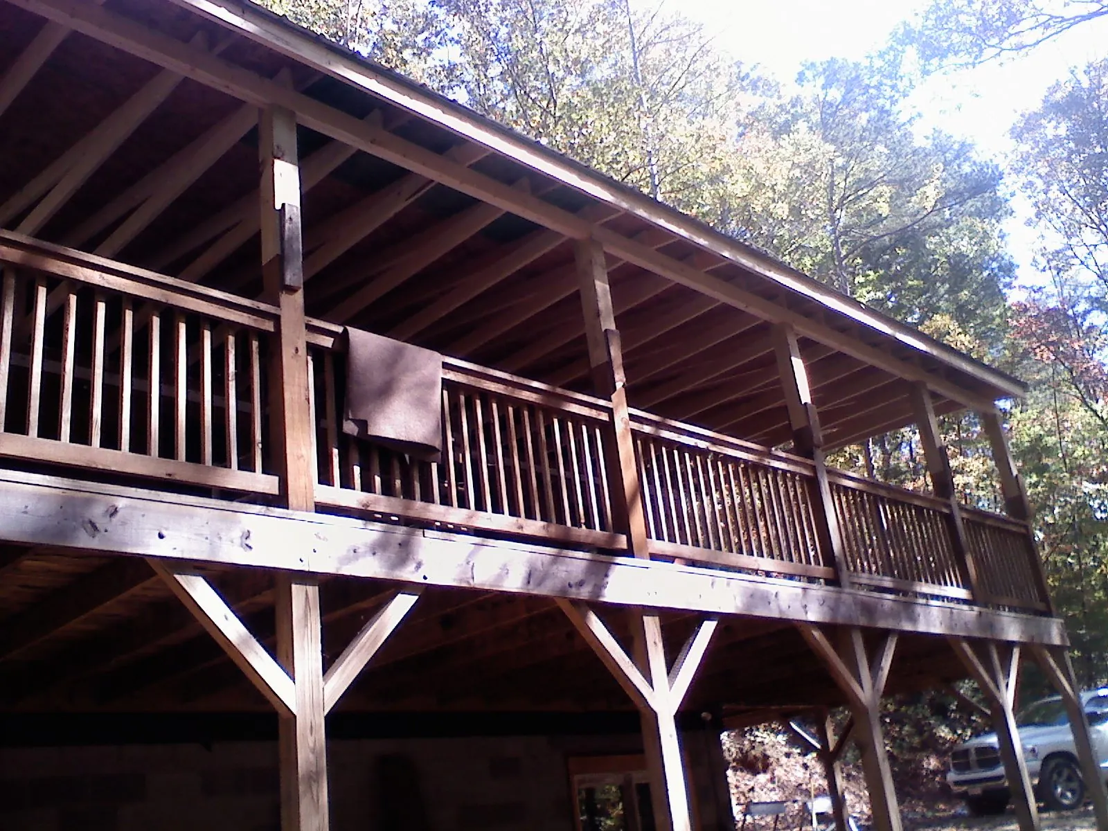 Timber framing under a new elevated porch and deck — Roof Leak Repair in Jonesborough by Roofing Brothers